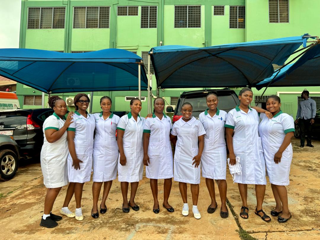 Nursing team of Gary Marvin Memorial Hospital standing together outside the hospital